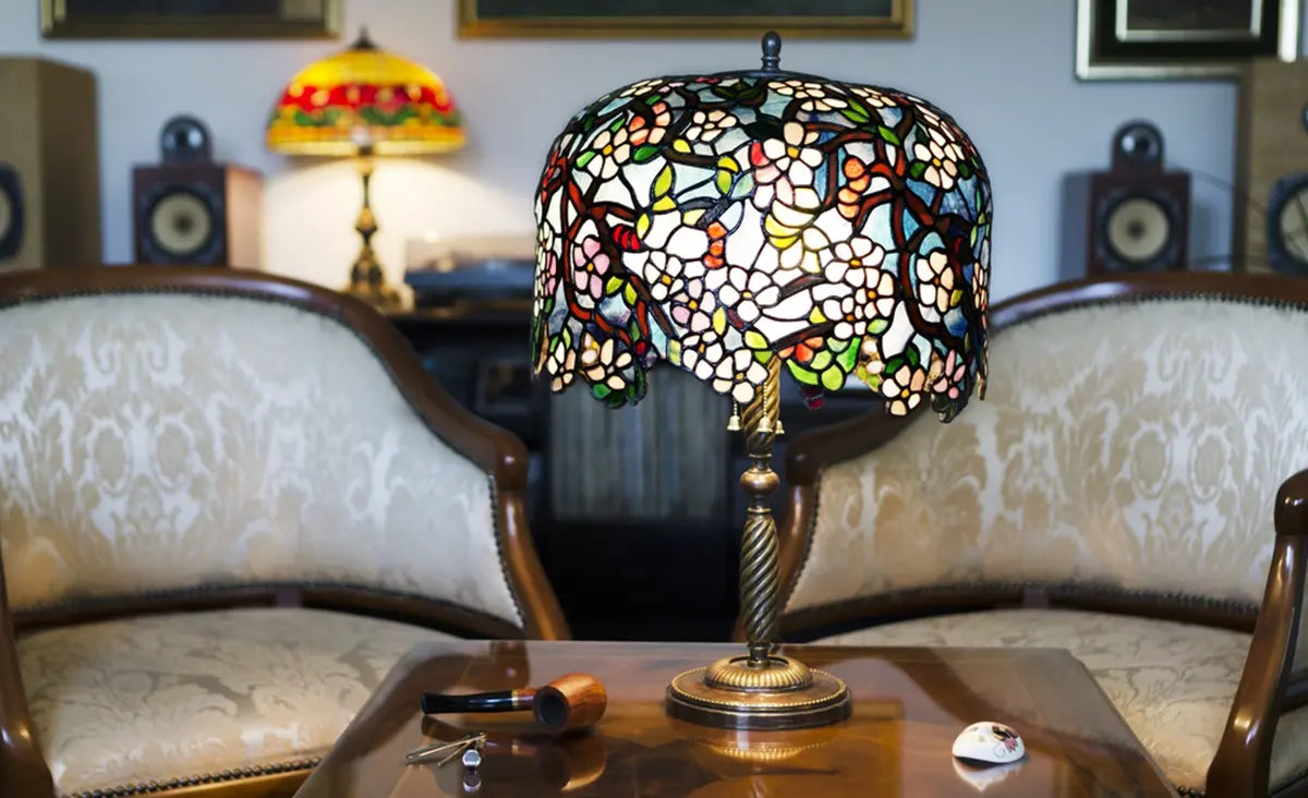 Beautiful Tiffany lamps on wooden table