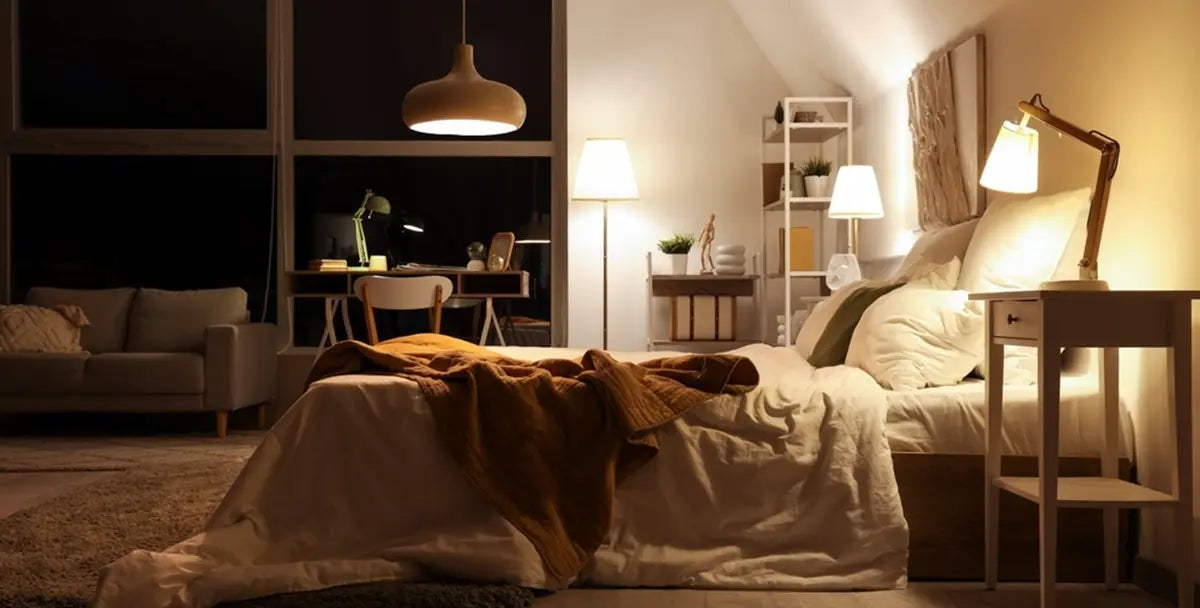 Interior of bedroom with glowing lamps at night