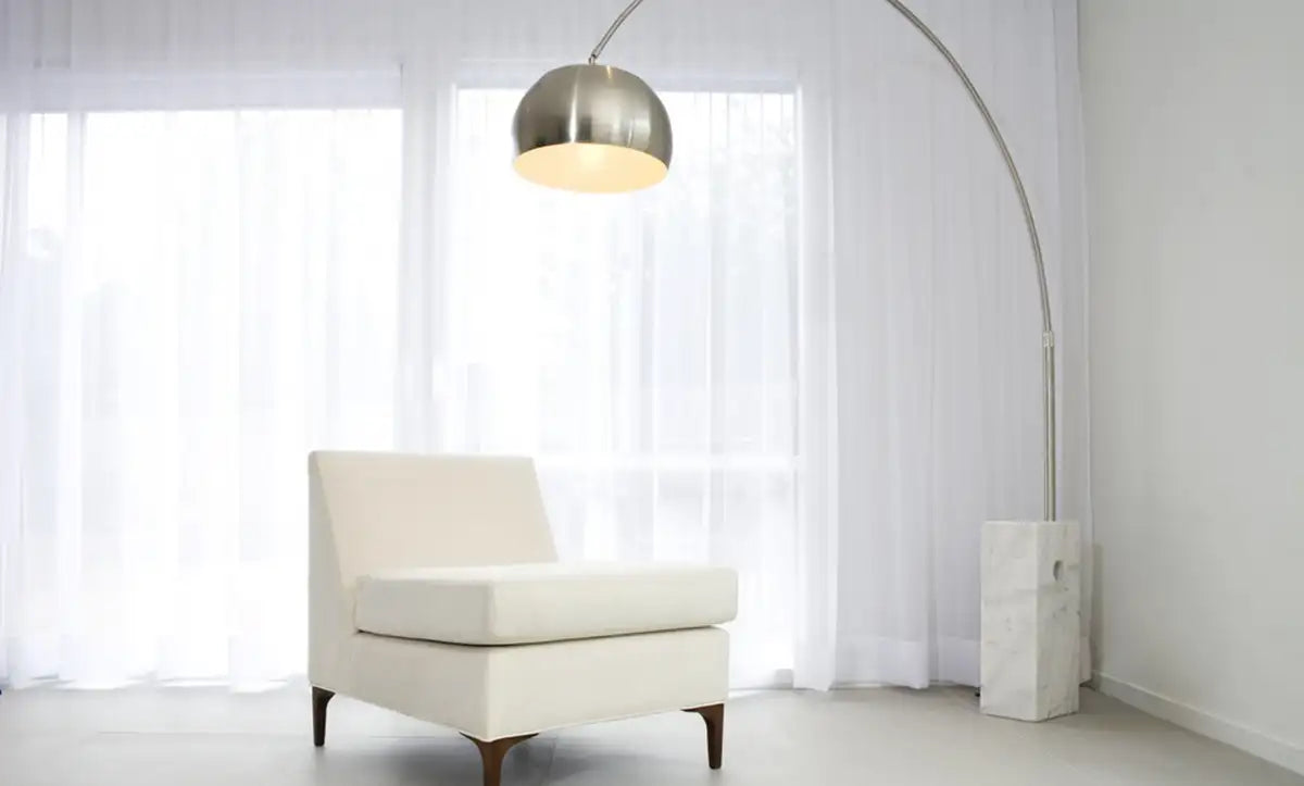 arc floor lamp in corner